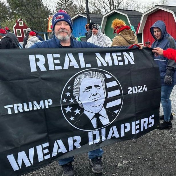 Caption this picture of Trump supporters who are trying to sell the idea 'real men wear diapers.' Best one wins. 🏆