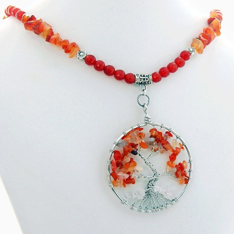 Explore the beauty of the Tree of Life Fall Carnelian Natural Stone Necklace from RivendellRocksSedona 🍂💎 Elevate your style with this stunning piece! #FallFashion #NaturalStone #RivendellRocksSedona buff.ly/3H2qpbk