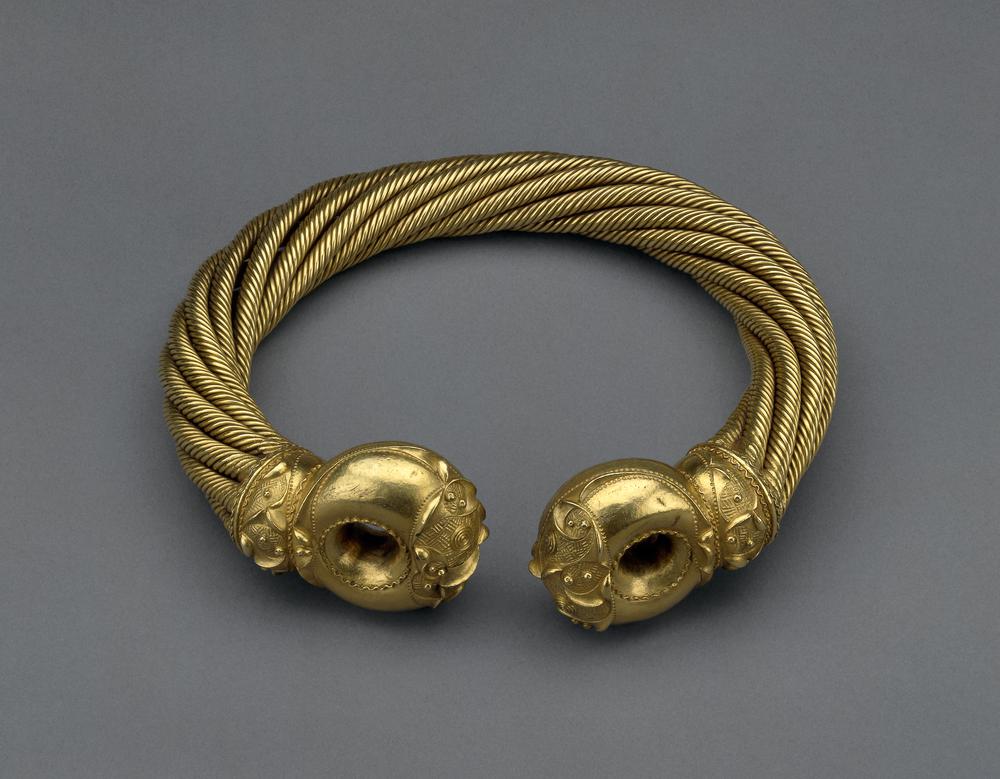The Great Torc from Snettisham is a remarkable artifact. This large Iron Age torc, or neck ring, is made of electrum, an alloy of gold and silver, and dates back to the 1st century BC. It’s considered one of the finest pieces of early Celtic art.