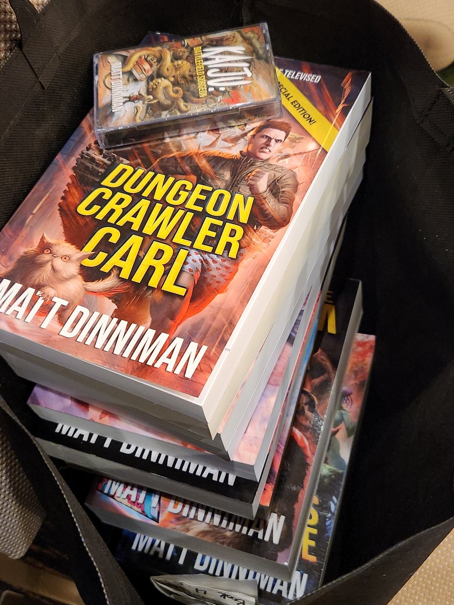 mistyfigs's tweet photo. Doing worry, I left books for you all. If you want copies of #dungeoncrawlercarl get your ass to @crypticon. It opens tonight and goes thru Sunday. https://t.co/84BYKit8D9