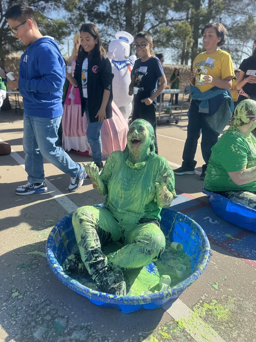 AGuerrero_HHES's tweet photo. Can you guess who the Hornets preferred to slime the most!? 🤭💚🧪 Ms. @HHeights_ES? Was it Ms. @ELuna_HHES? Or Ms @edithc_HHES? #PrincipalChallenge #GreenSlime https://t.co/x9pGsSLZbs