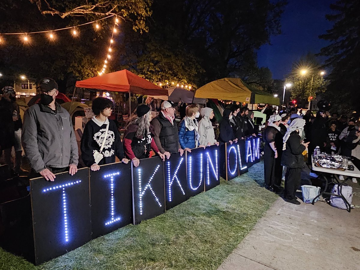 Voices sing, quiet conversations, Shabbat along with Muslim prayer, candles in the night and TIKKUN OLAM held by Holders of the Lights;“Repair the World.” There is a lot of work to be done!
University of Wisconsin - Milwaukee encampment #freepalestine #tikkunolam #endthewaringaza