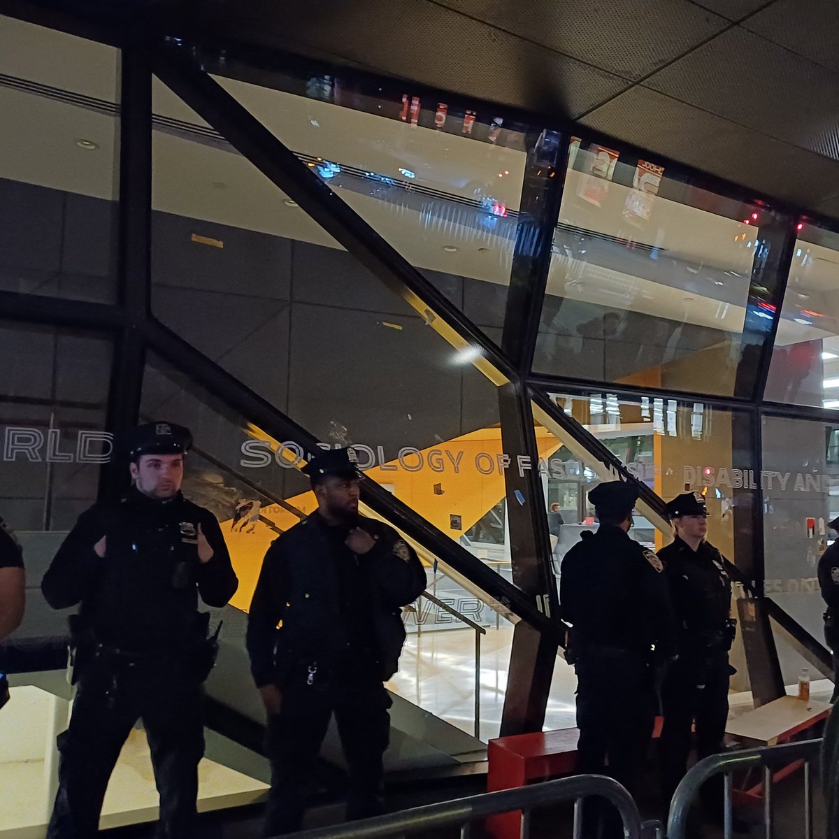 The police are, amusingly, standing in front of a window embossed with the phrase 'Sociology of Fascism' one of many terms meant to evoke the @thenewschool brand of 'critical thought' allied with 'social justice': an increasingly hollow sales pitch.