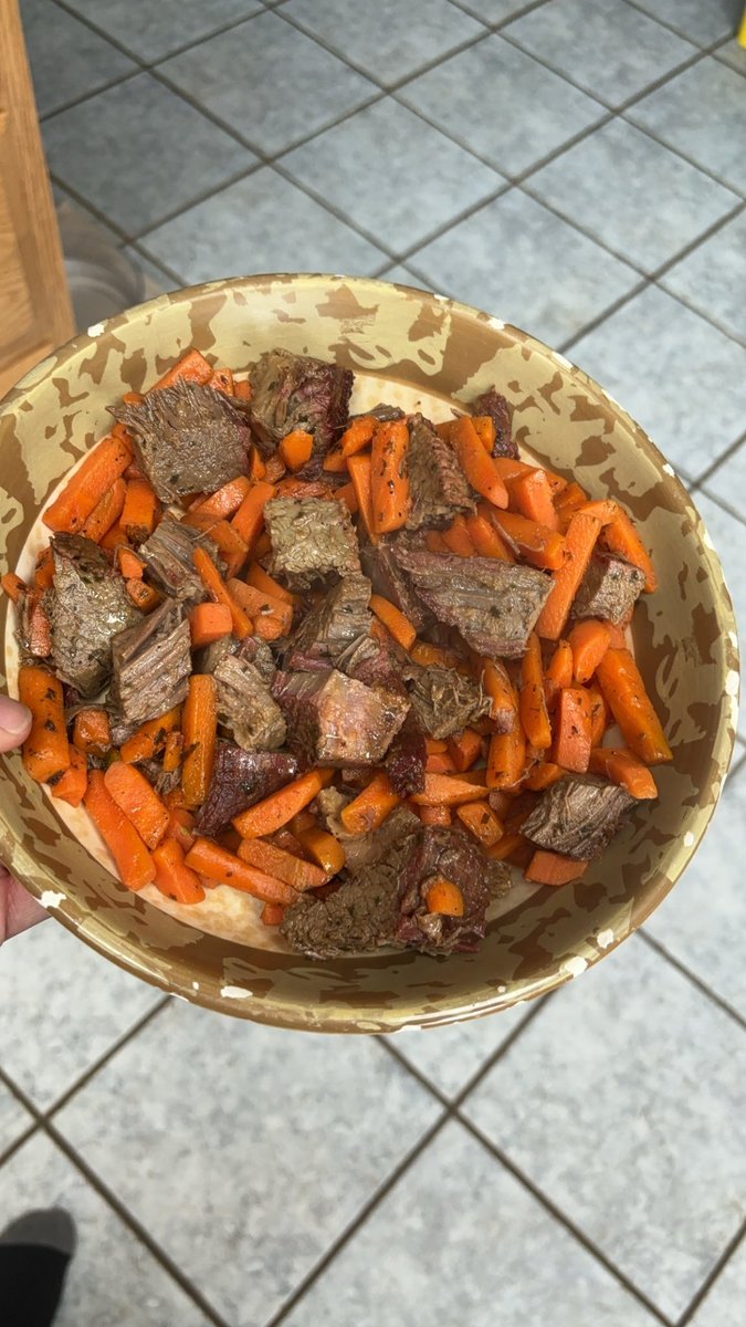 Smoked brisket and garlic butter carrots