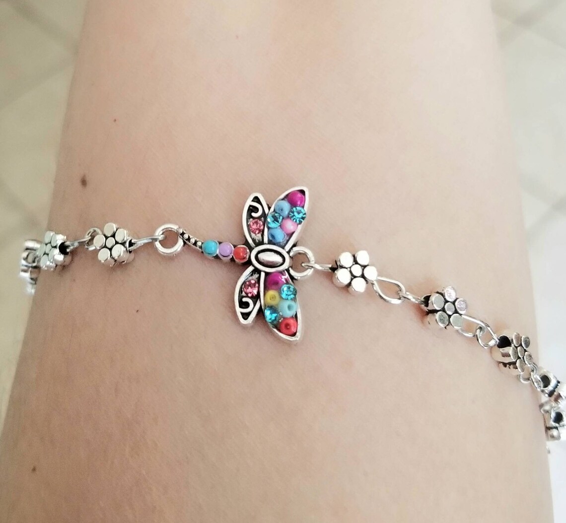 Silver Flower Anklet, Dragonfly Charm Anklet,  Flower Anklet or Bracelet,  #Anklet #Dragonfly #Bracelet #floweranklet #flowerbracelet #dragonfly #daisy #daisies #handmadejewelry #giftsforher #handmadegifts #Mothersday #Mothersdaygifts 

etsy.me/4a3DoWn via @Etsy