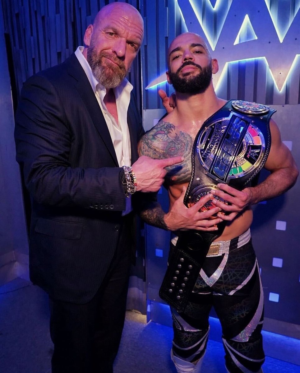 Triple H and Ricochet showing off the new WWE Speed championship 🏆