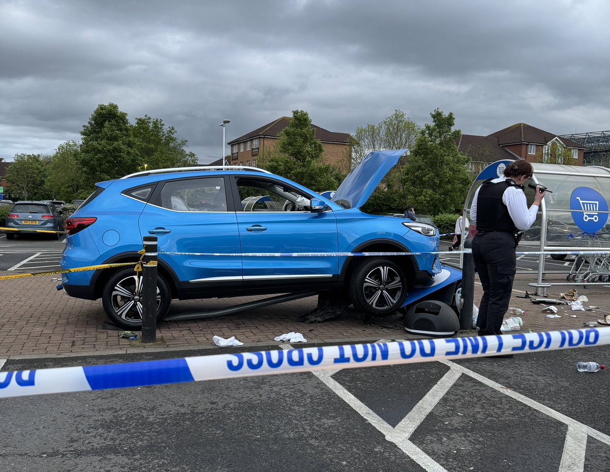 Si11y3gg's tweet image. Not something you see everyday at Tesco Twickenham. The car has crash through the bollards onto the pedestrian walkway, taken out a signpost and a rubbish bin.  Apparently one pedestrian also #crash #accelerator