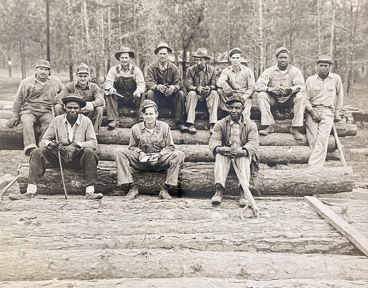 A logging crew in Jasper, Texas. This is undated, but judging by the clothing, I'm thinking it's perhaps the early 1950s. There's so much character in some of these men's faces. The man fourth from the right in the back row looks like he's got some stories to tell!