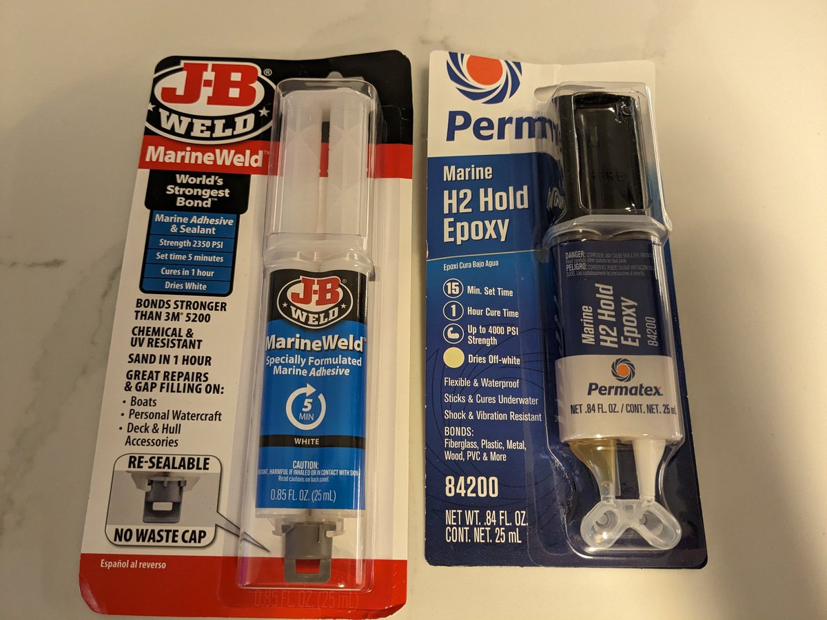 i gotta fix a fiberglass crack tomorrow. which one do i use?

reqs:
- crack is under waterline (salt water)
- needs to survive light impacts 
- fix needs to be long lasting