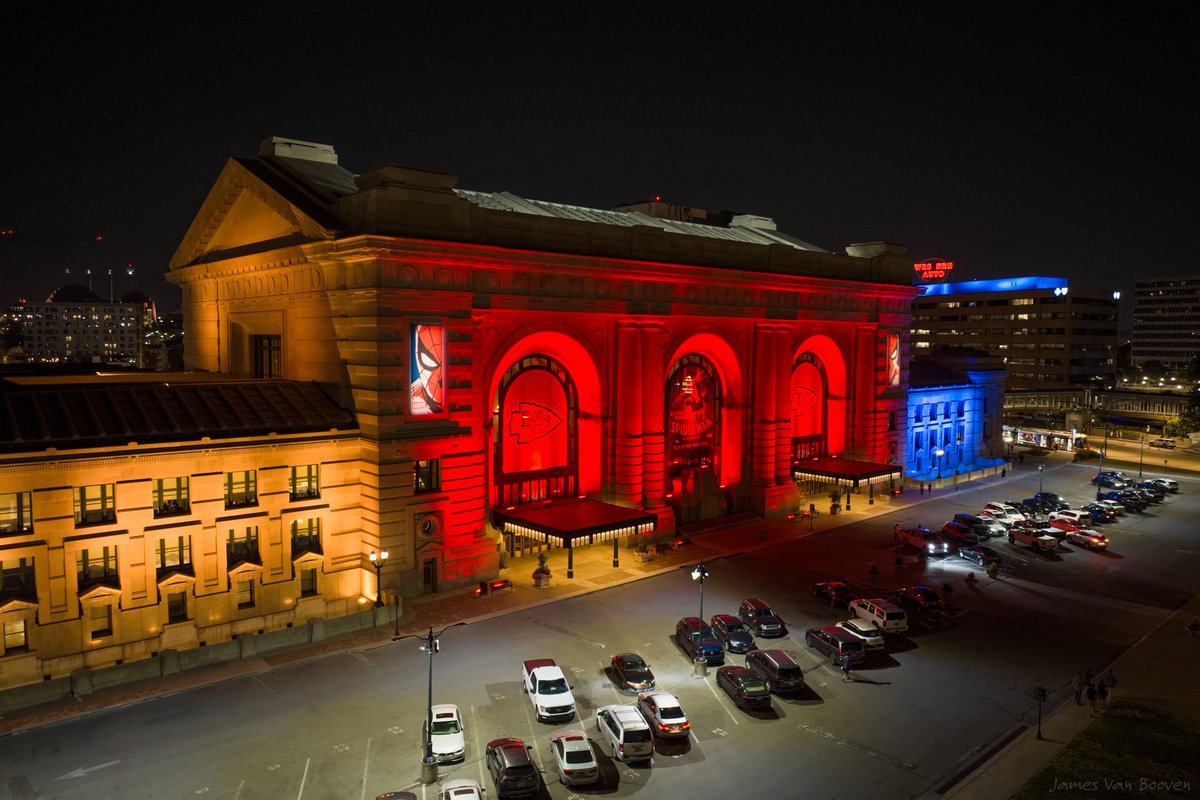 Tonight, Union Station features a special lighting display in @NASCAR yellow, red and blue, as we welcome fans from across the country to race weekend at the Kansas Speedway. 2023 photo by @JamesDVB, Delightful Lunatic Photography.