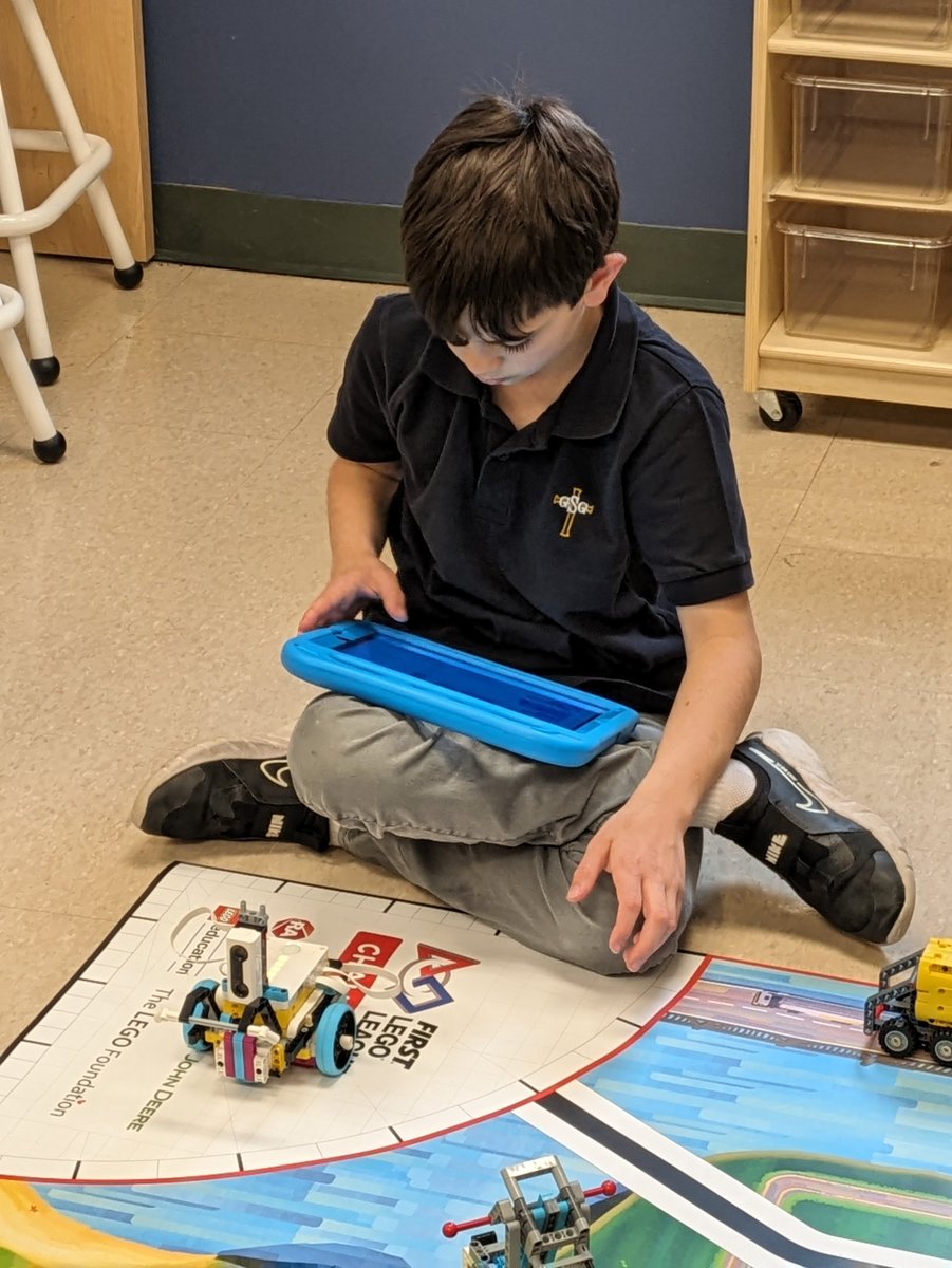 StGregoryCA's tweet photo. The gr.5/6 P class was working hard in the LLC today. They have started the coding and debugging process of their robotic vehicles. @CAD_ycdsb @YCDSB @CarmelaRaspanti https://t.co/LhyxRUGyBR