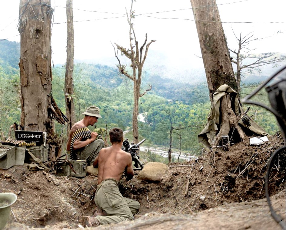 Pfc. Sam P. Montana of Rockford, Illinois, and Pfc. Joe G. Maduna of Dickinson, North Dakota, both with the 25th Combat Team, 93rd Infantry Division, manning a .50 cal. MG on Hill 250, Bougainville, Solomon Islands.
8 April, 1944.
Photographer: Gilman