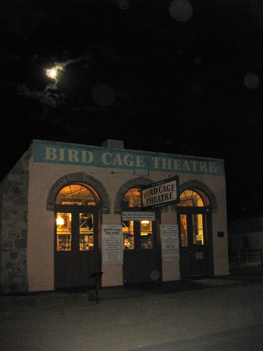 At the end of a #GhostHunt at Birdcage Theater in #Tombstone AZ,  I took this picture when the building was closed at 4 AM.   Look closely at the set of windows on the right side of the building.  Do you see a transparent person looking out? 👻

 #NationalParanormalDay