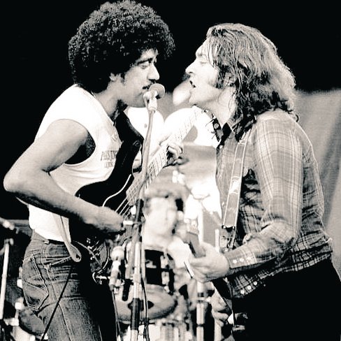 Phil Lynott of Thin Lizzy and Rory Gallagher in 1982. Photo by ©Colm Henry