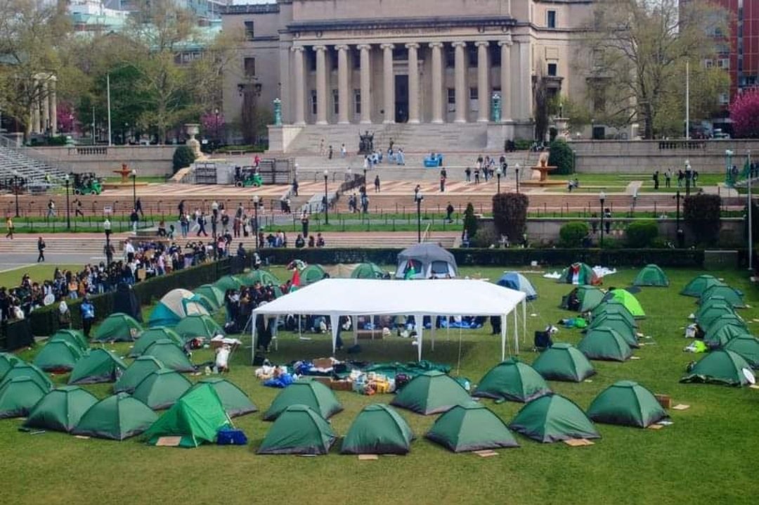 What do you notice most in the picture below? Something odd about those campus tent encampments. Almost all the tents are identical - same design, same size, same fresh-out-of the-box appearance. Which suggests that rather than an organic process, whereby students would bring a…