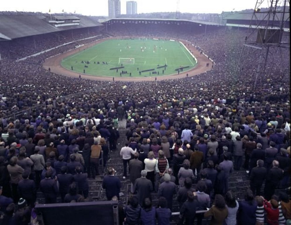 The old dirt terraces of Hampden in 1974. You'd need binoculars at the back of those vast old terraces to see the play. You were covered in dust on a dry day & mud on a wet one. Pretty primitive conditions then.