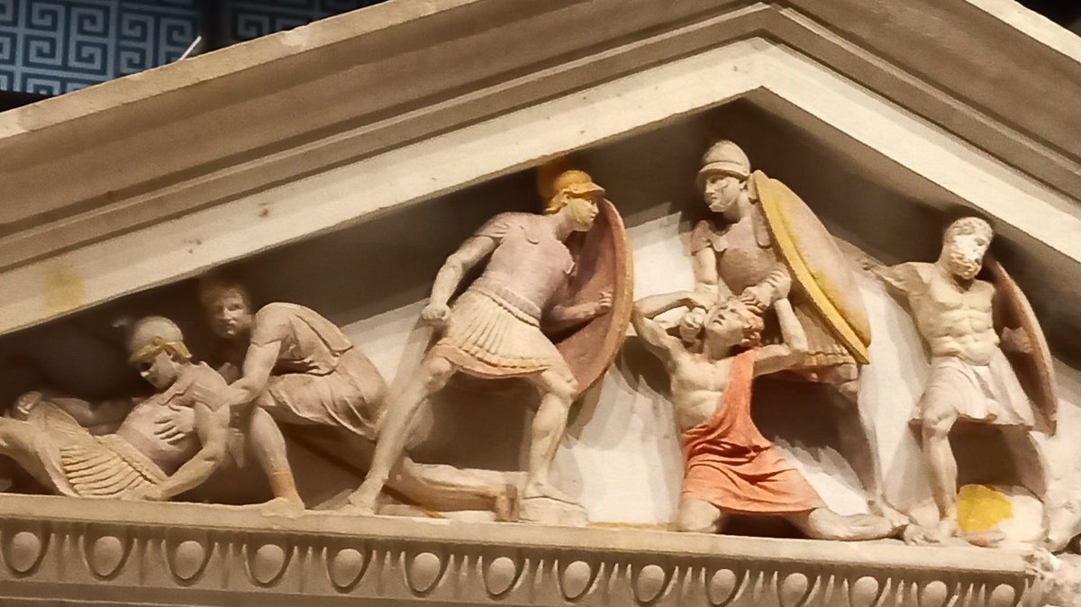 Colourful (literally) detail from the 4th-century 'Alexander Sarcophagus' for #SarcophagusSaturday. Soldiers prepare to execute an unarmed prisoner in Greek dress. This could be the diadoch Perdiccas, who was murdered by his troops in the civil wars following Alexander's death.