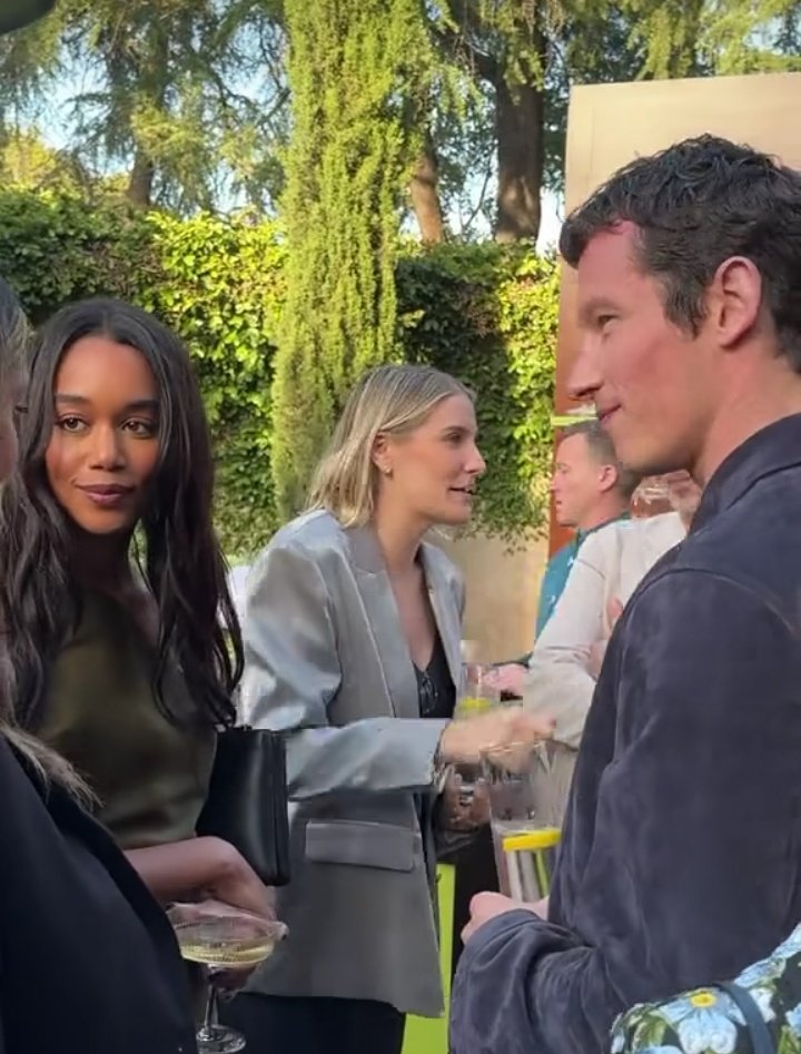 thinkerllum's tweet image. callum turner and laura harrier at an event