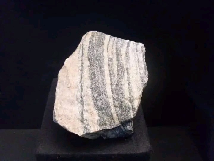 The Acasta Gneiss is a tonalite gneiss in the Slave craton in Northwest Territories, The rock body is exposed on an island about 300 kilometres north of Yellowknife. The rock of the outcrop was metamorphosed 3.58 to 4.031 billion years ago