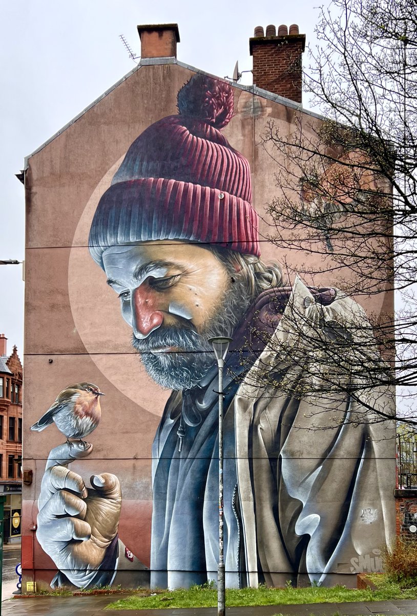 #AlphabetChallenge #WeekS - 'S' is for Saint by 'Smug' (Sam Bates). One of #Glasgow's famous murals, this one depicts the city's patron saint, St Mungo, in modern dress. The robin figures in one of the miracles he reputedly performed

#muralMonday