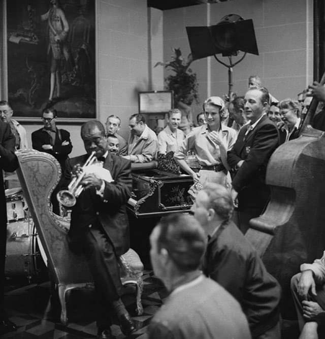 Louis Armstrong, Grace Kelly and Bing Crosby on the set of the film 'High Society' (1956)