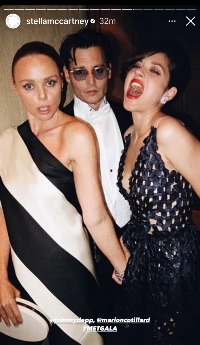 Johnny Depp reposting @StellaMcCartney ‘s story of a photo of Stella, Johnny & Marion at  the 'Charles James: Beyond Fashion' Costume Institute Gala at the Metropolitan Museum of Art on n New York City.
