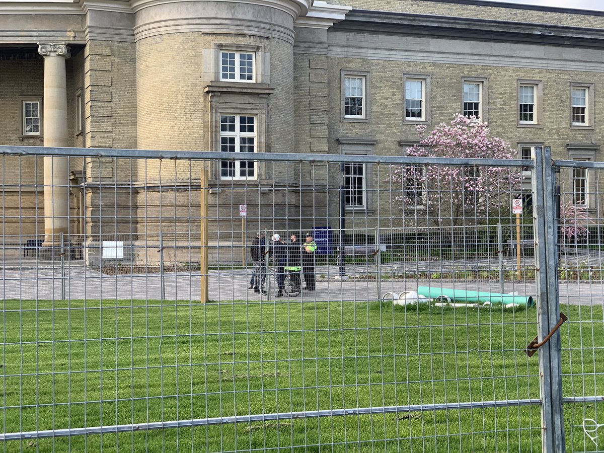 good morning bugs, was awoken quite suddenly. this morning while we were sleeping, campus security began to cut the fences that UOFT PUT UP (“for convocation”) directly threatening the safety of the encampment.