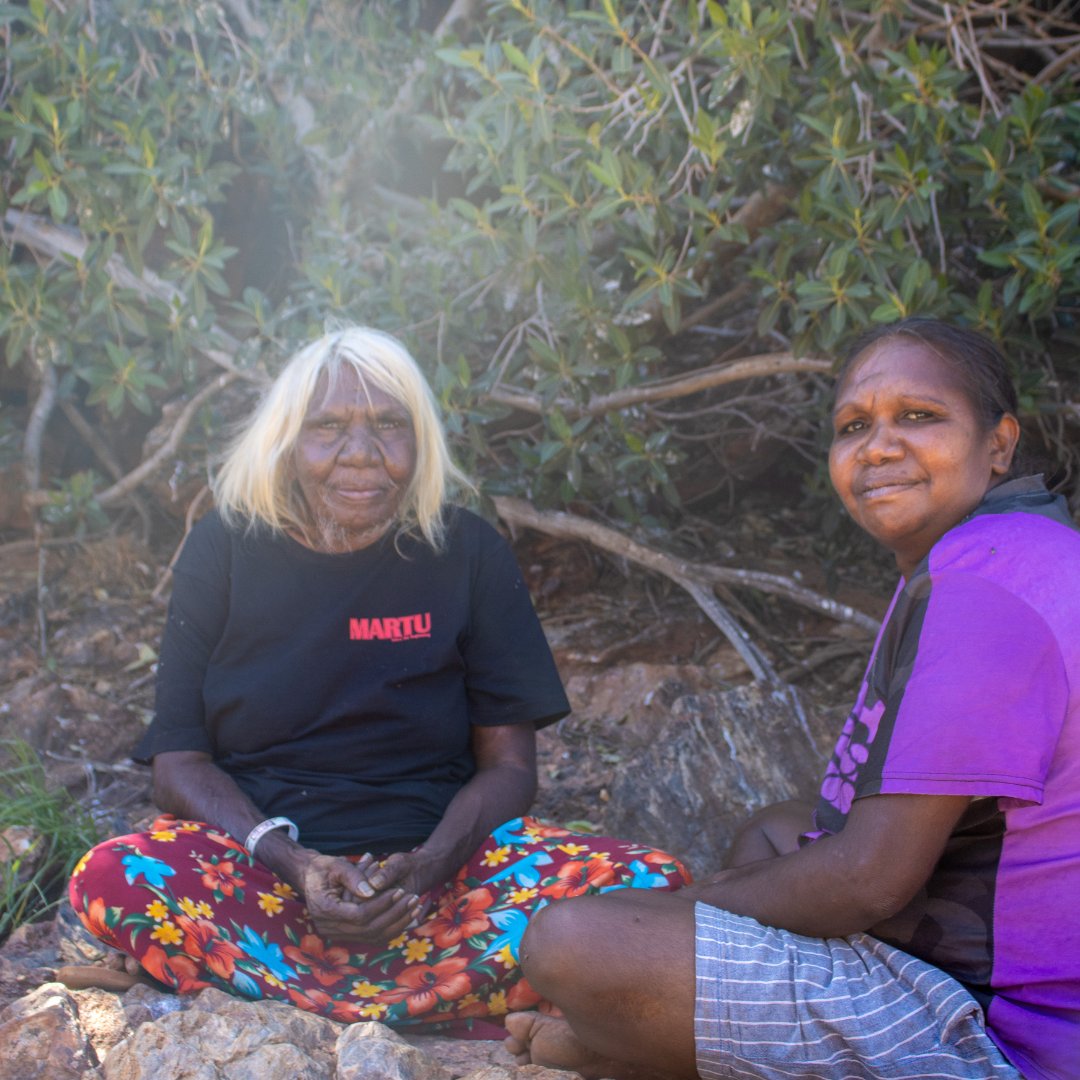 On a trip with #KJMartuRangers, Elder Nola shared stories of the 1980s #HomelandsMovement. The team were on-Country monitoring #NorthernQuoll, using Nola's traditional knowledge. These trips support #Conservation and strengthen #MartuCulture for #FutureGenerations.