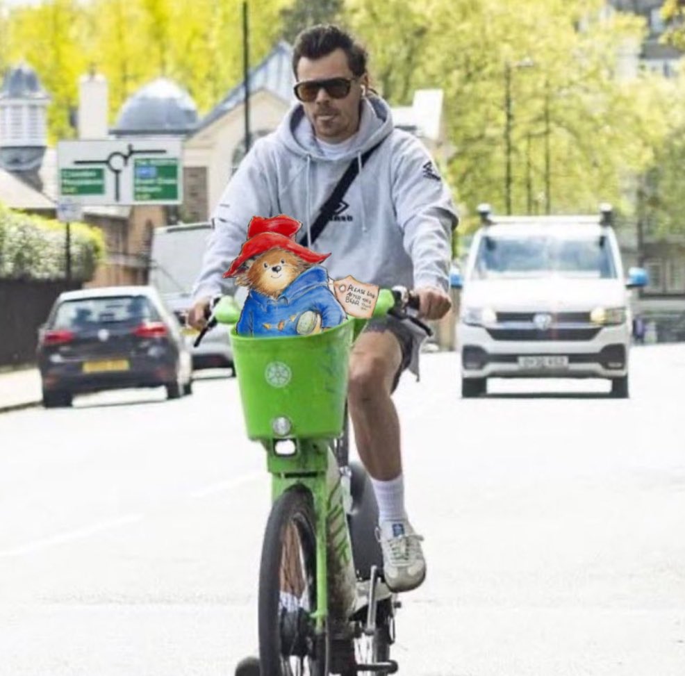 Harry and Paddington bear cycling in London recently!