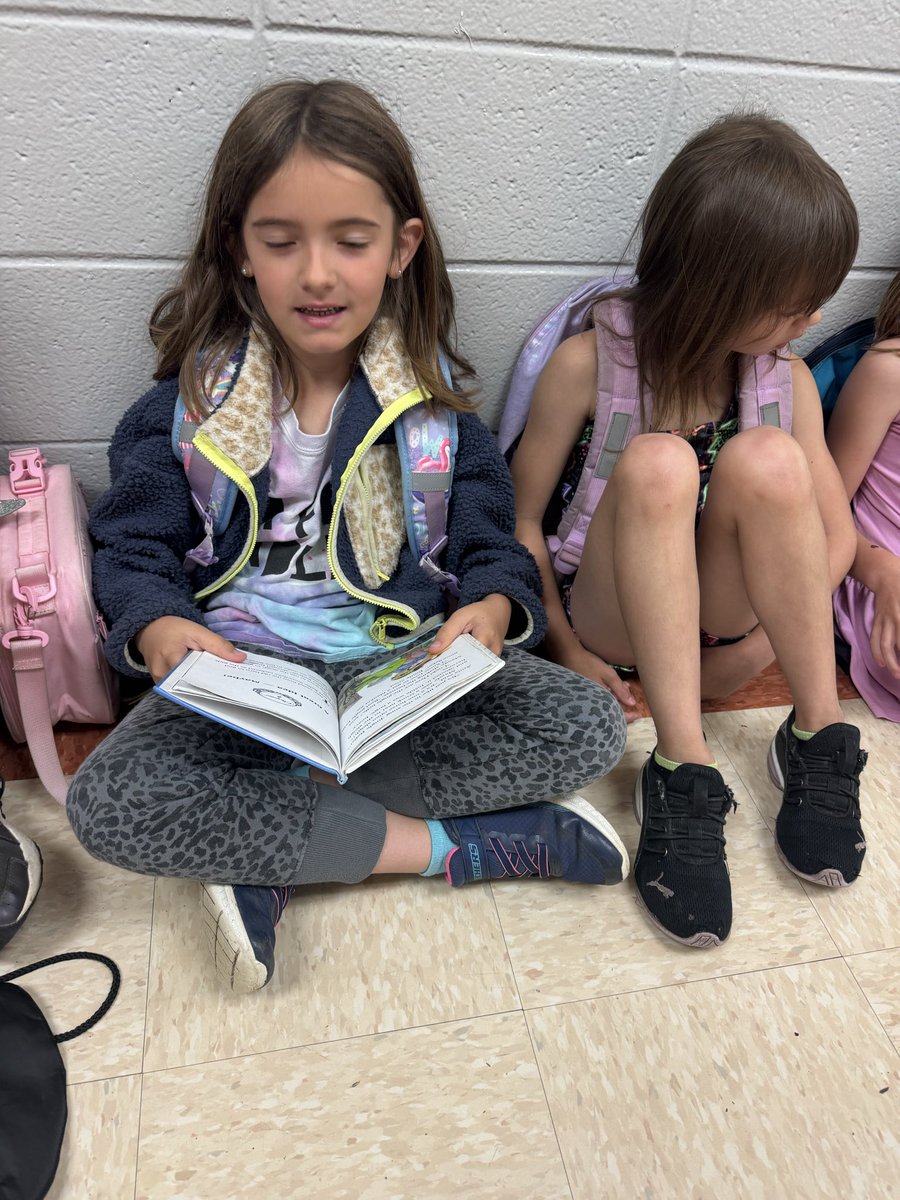 Our first graders like to read in the mornings when they wait for class to start. Smart cookies!