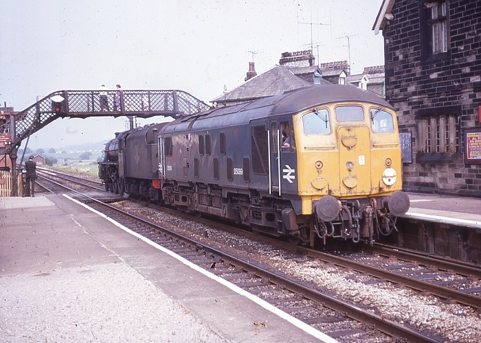 Class 24 No.D5099 and Class 5 4-6-0 No.45017 pass through Hest Bank station on July 27th 1968. Regular steam operation on British Railways has about a week left. Webmaster.