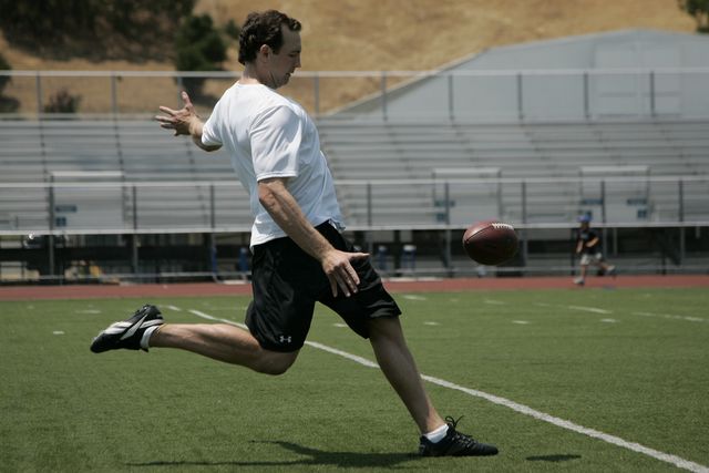 Nick Harris former NFL punter prepares to punt the football