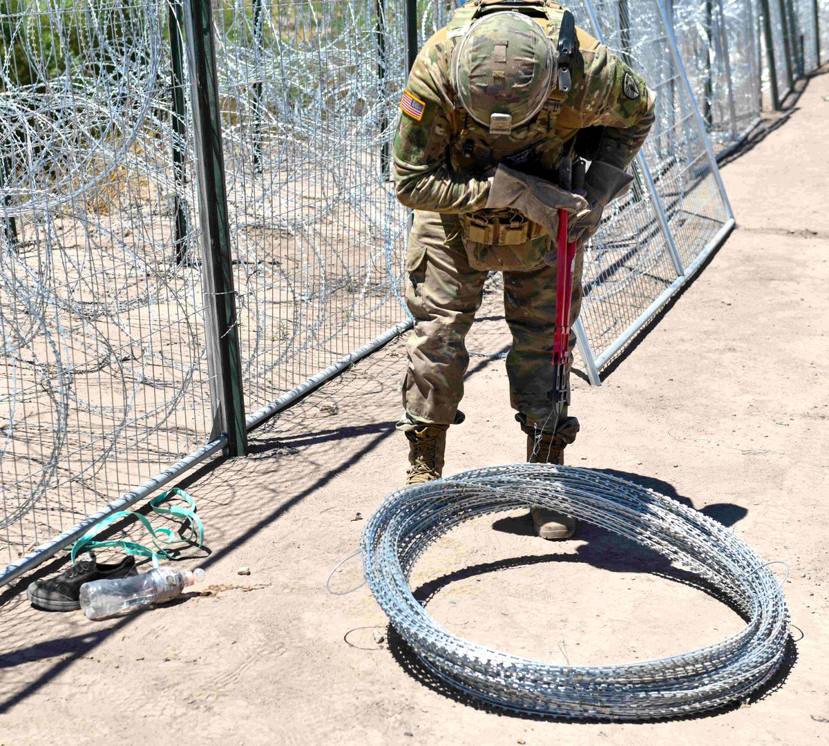 Holding the line. Texas National Guard Soldiers repair breaches and maintain anti-climb barriers to prevent illegal border crossings, keeping Texas and the Nation safe.  #OperationLoneStar