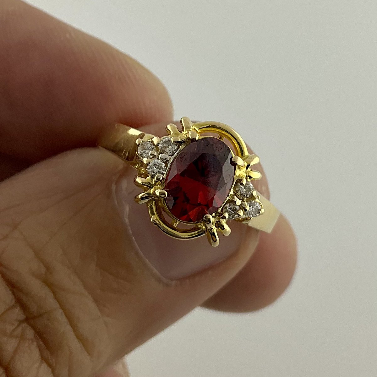 Available now! Ladies stone and diamond ring set in 3.8 grams of 18k gold! Features a red oval center stone and 6 diamonds for .06 ctw! Take it home for only $463 out the door!   #pawnshop #oakland #sanfrancisco #bestcollateral #gold #redstone #diamonds #stonering #mothersday