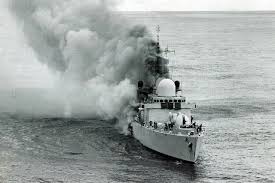 May 4th 1982: The Exocet's remaining fuel erupts into flames, and the missile has struck the vital nerve centre of the ship, knocking out damage control & fire suppression systems, as thick smoke from melting cables becomes unbreathable, but the crew still fight the raging fires.