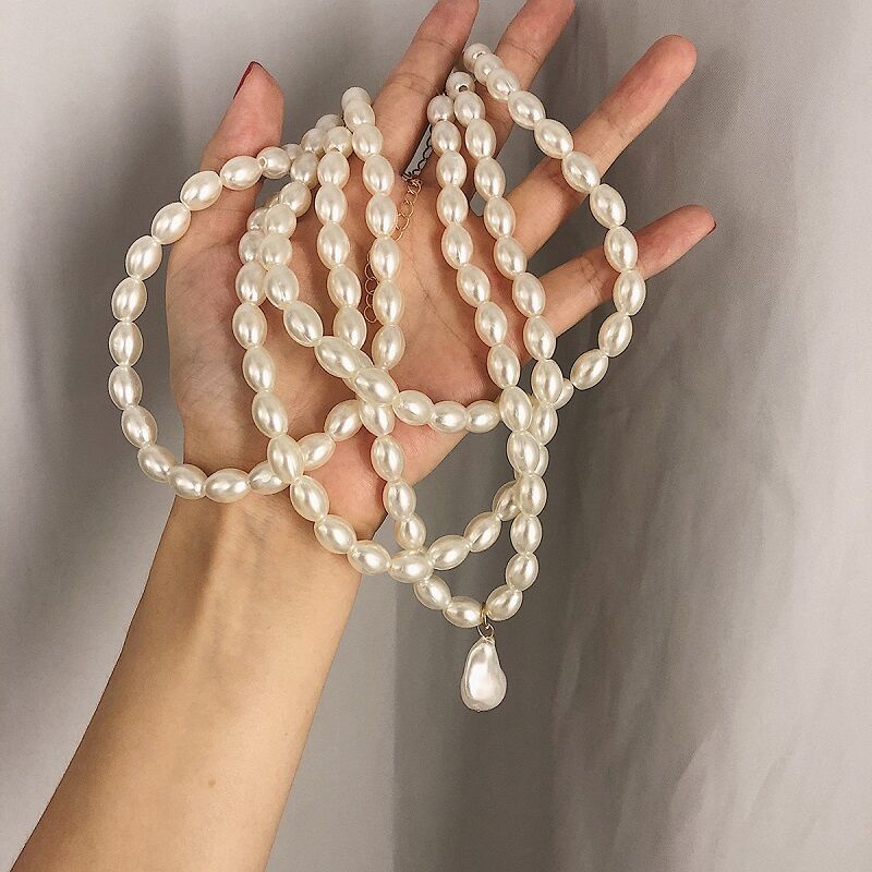 Step into a world where elegance meets modern design with Yongxi’s multi-strand pearl choker. Your next statement piece is just a click away! YongxiJewelry.com #LuxuryJewelry #PearlJewelry #YongxiJewelry #PearlChoker #BaroquePendant #PearlNeckalce #WomensJewelry #GiftForHer