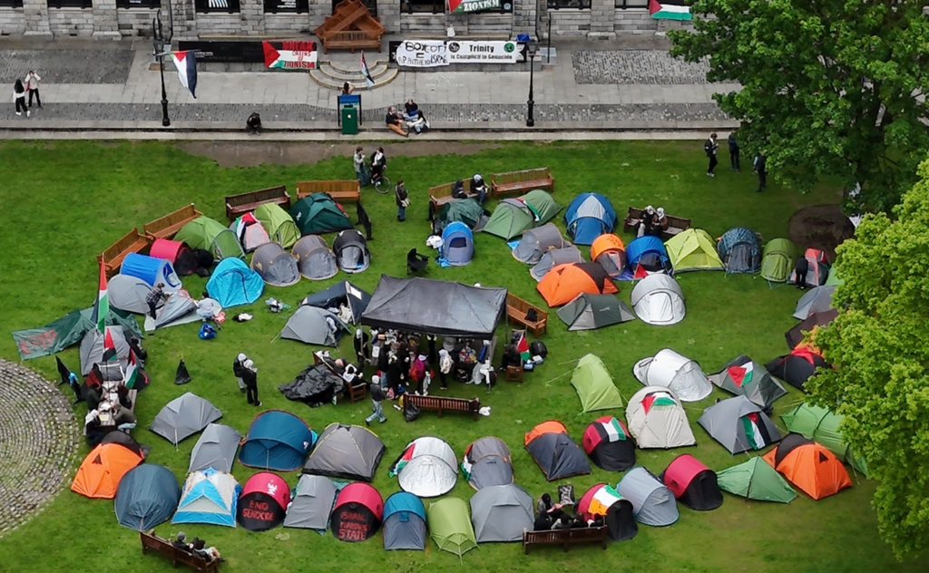 Students taking part in an encampment protest over the Gaza conflict on the grounds of Trinity College in Dublin