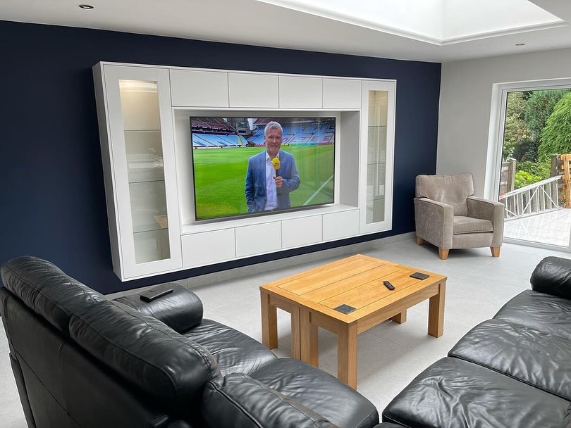 One of Revelle Interiors Limited recent projects. A media wall incorporating an 85 inch TV looks fantastic in this open plan living space 🏠 Some might say this is the perfect set-up for watching the UEFA Euro 2024 championship ⚽