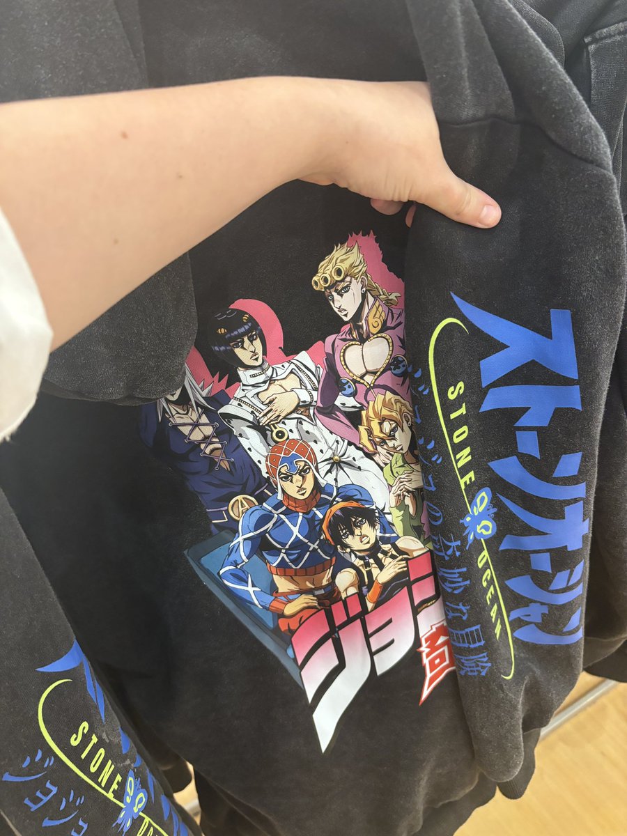 bootleg anime store in the mall selling a hoodie that has stone ocean on the sleeves but golden wind on the back i’m cryin