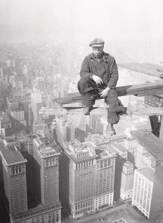 A skyscraper builder seated at 800 feet above the ground, 1929.  🫡