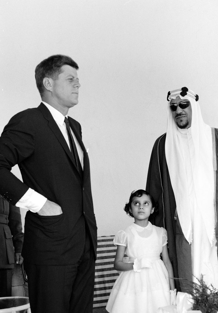 U.S. president John F. Kennedy and King Saud with his daughter, Princess Dalal, 1962.