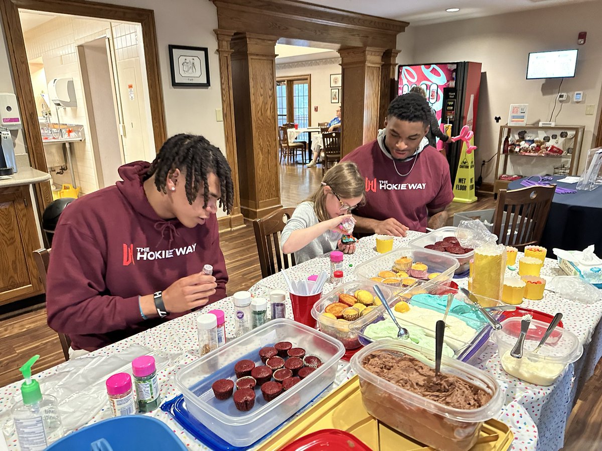 Rain didn’t stop @rmhcswva’s Tab Top Extravaganza today! @HokiesFB’s @CalebWoodson3 and @jaydonald_ were there to support RMHC’s mission and engage with the community.