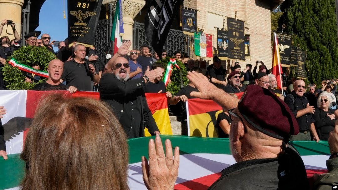 Several Spanish flags in the Fascist tribute to Benito Mussolini in Dongo