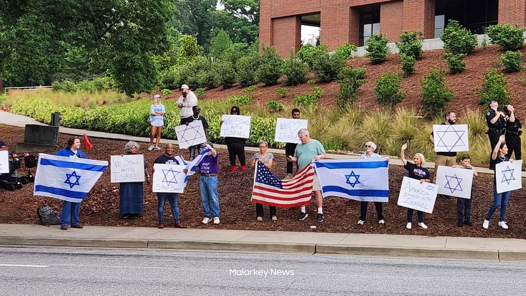 Nothing seems to be escalating as far as I've seen from the on the ground reporters- Pastor Mark Burns (a Trump-endorsed candidate for South Carolina's 3rd Congressional District) is currently leading a pro-isreal counter protest