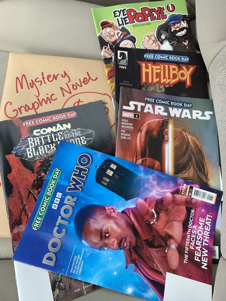 Free Comic Book Day haul from Infinity Flux Comics in Chattanooga, Tenn. today. Waiting until I get home to open the mystery graphic novel. All I know is it’s DC and written 50 years ago.