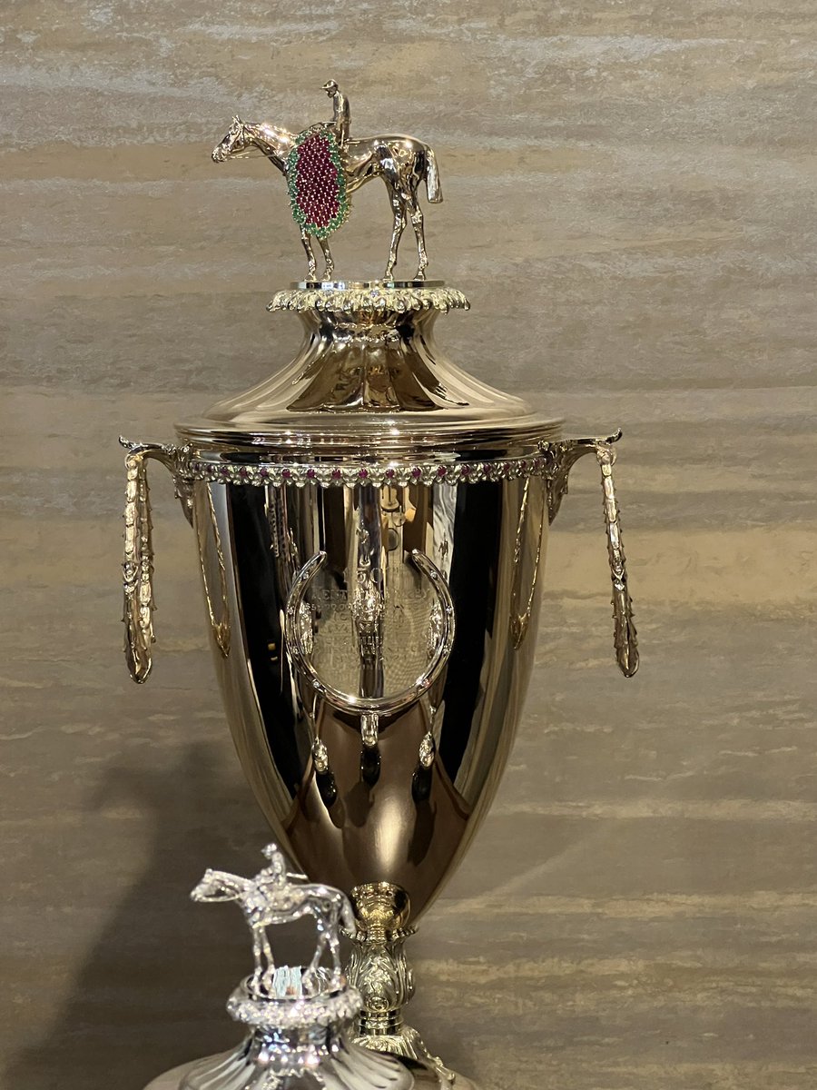 Diamonds and emeralds and rubies, oh my! That’s one gorgeous #KentuckyDerby150 trophy and one serious security team.