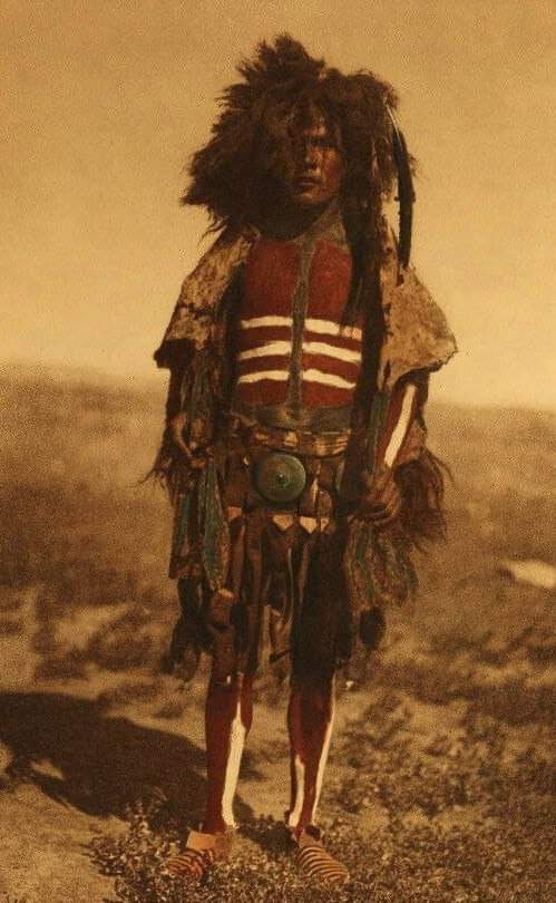 MANDAN DANCER: In what resembles half afro/half dreadlocks, this Mandan man is prepared for the Buffalo Dance. The Mandans are quiet on the pages of Indian Wars texts, compared to their Plains neighbors the Lakotas, Cheyenne, Blackfeet, Arapaho, Comanche, Crow and others. If