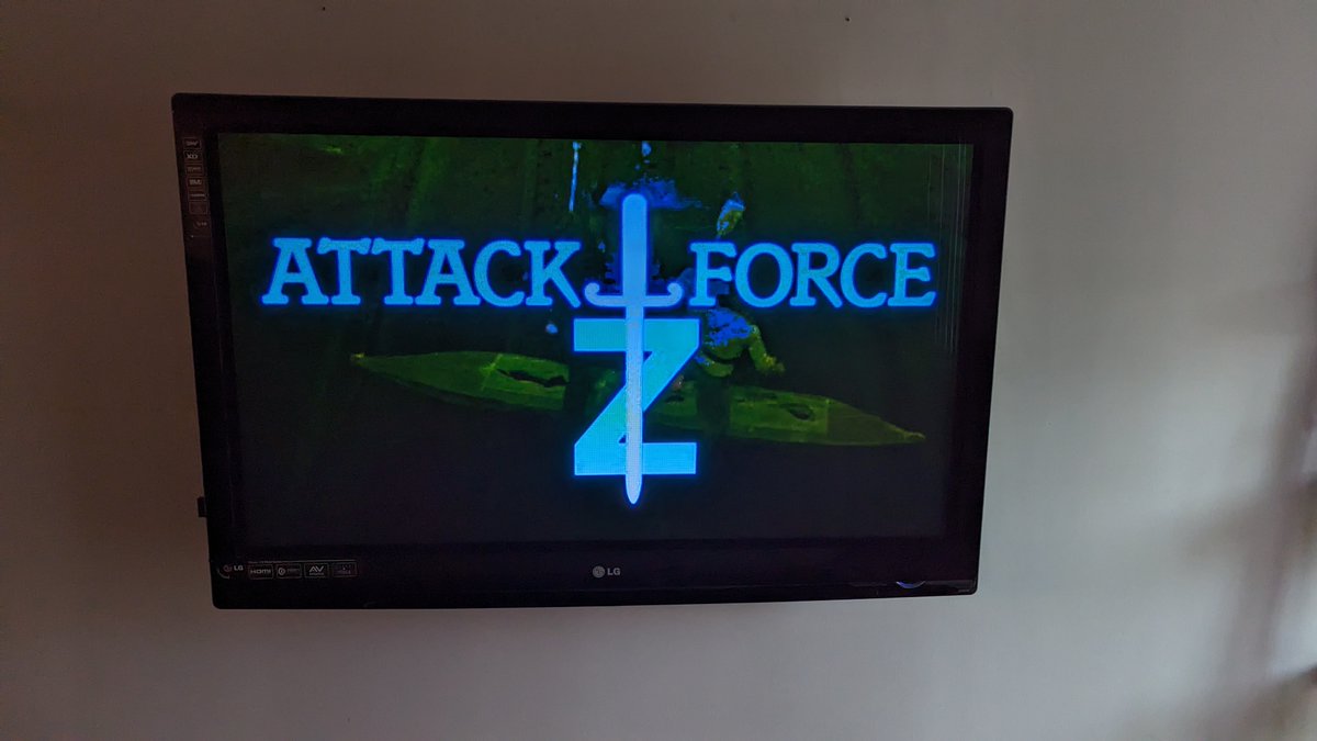 Got myself a region free Blu-ray player this week. Now, for the first  time, I can watch one of my Region 2 (PAL) DVDs on my TV and not just on  my computer. Shown here is the title screen from 'Attack Force Z', a great movie about ANZAC special forces during WWII. 1/2