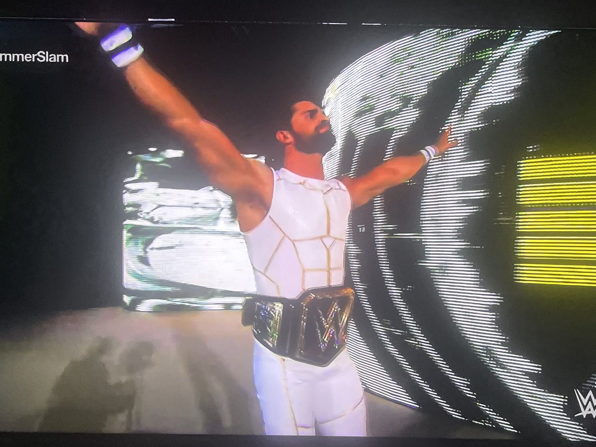 just got chills seeing Seth come out in the white ranger attire. Summerslam 2015 Seth Rollins has insane aura