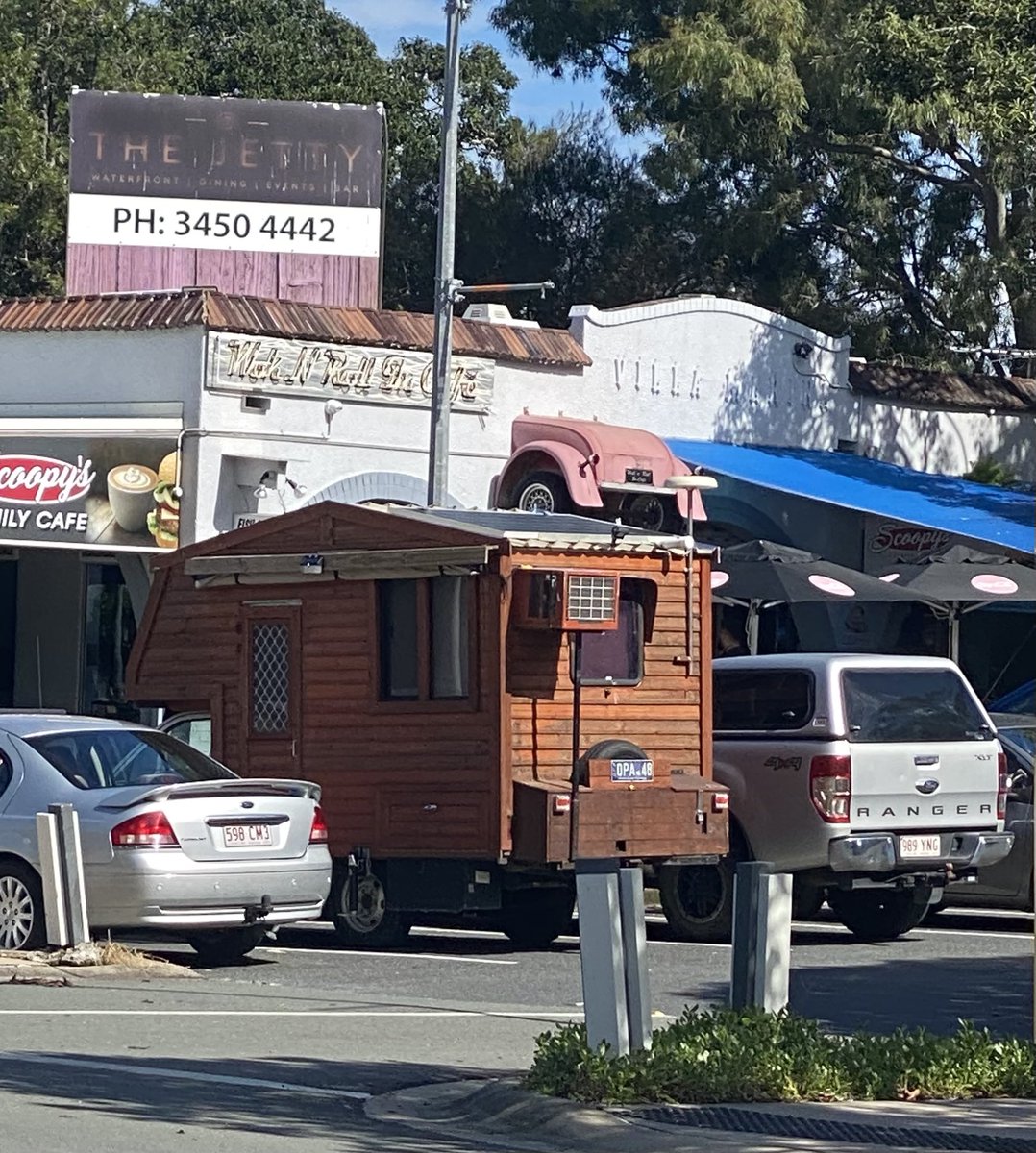 Saw this on the way back from our walk today. So, is this a really tiny home, an old motor home with a difference or a food truck. My guess is it belongs to a grey nomad who wanted a custom built campervan . What do you think? #Campervan #RVLife